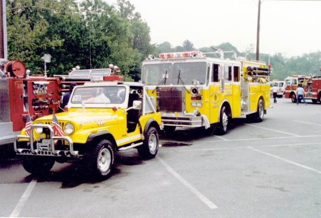 Jeep 3 & E-32 at parade in Great Cacapon, WV 1987