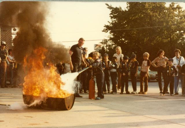 Melvin Tennyson and Jay Hansen on the extinguisher