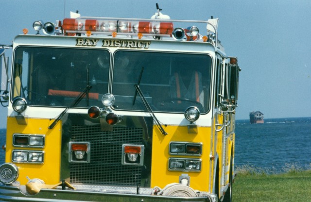 Old Engine 32 on Pax River NAS with Cedar Point Light House in the background