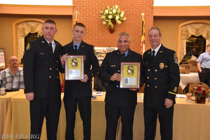 Firefighters Steve Vaness and Lonnie Thompson receive